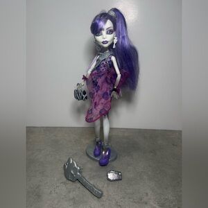 monster high Spectra-Inspired Doll with Purple Hair and Pink Dress